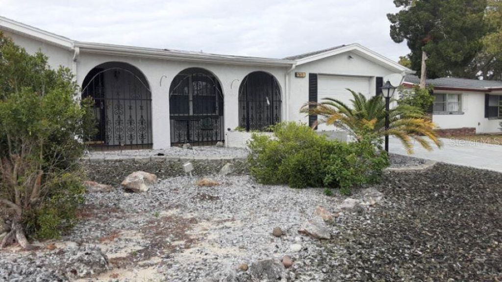 Photo of 7615 Sue Ellen Drive, Port Richey, FL 34668 (MLS # O6373656)