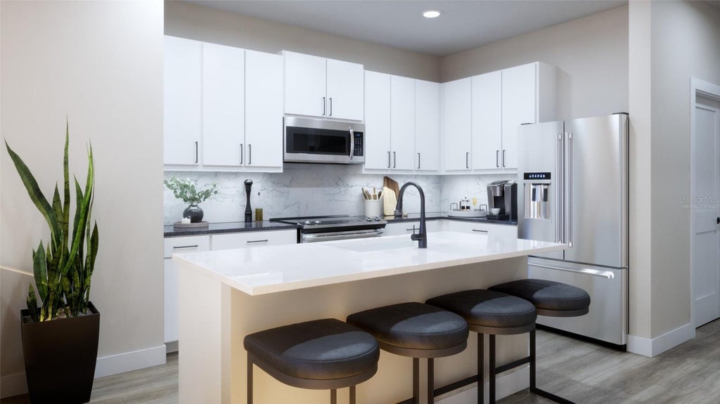 Photo of 1932 Greenborough Loop, Deland, FL 32724 (MLS # O6449871)