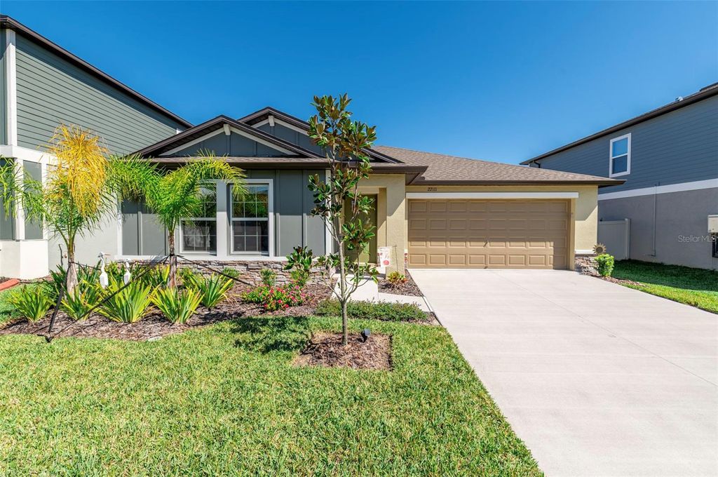 Photo of 22111 Nebula Way, Land O Lakes, FL 34637 (MLS # A4643430)