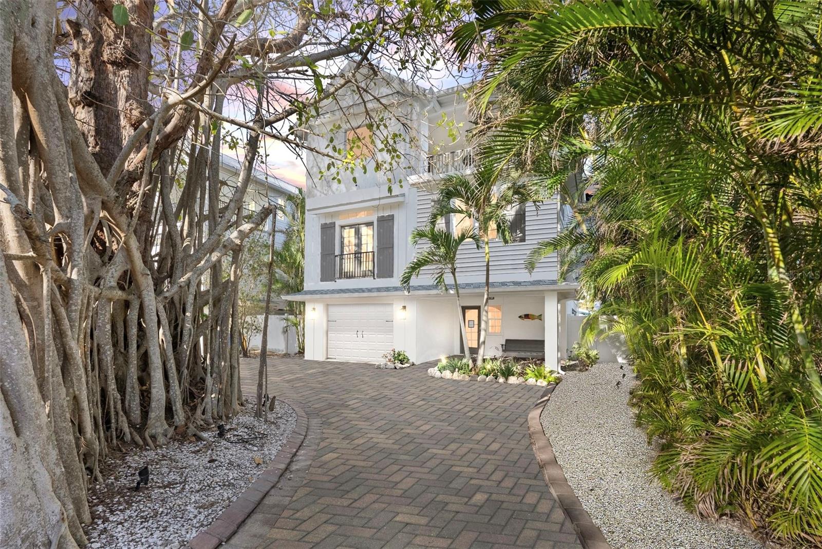 TURNKEY TROPICAL TREASURE: ANNA MARIA ISLAND’S ULTIMATE BEACH LIFESTYLE
Imagine stepping into your own slice of tropical heaven, where pristine Gulf waters meet unparalleled luxury and smart investing. This extraordinary Key West-style home is not just a property—it's your ticket to a life most only dream about. Newer construction (2015) and offering 2,601 sq ft, this architectural gem offers a perfect blend of personal retreat and powerful income generator.
The outdoor living experience is nothing short of spectacular, featuring a resort-style pool that transforms your backyard into a private oasis. A stunning rock waterfall cascades into the pool, while an expansive paver patio deck provides the perfect entertaining space. The thoughtfully designed outdoor living room, complete with a mounted TV for catching the big game, offers a shaded retreat with a patio covering for perfect dining outdoors and one that ensures cool comfort during those sunny and shelter from passing rainshowers. This is more than just a backyard—it's an entertainment paradise that will maximize every moment.
Inside, the home continues to impress with its carefully designed living spaces. The massive master suite is a true sanctuary, featuring a luxurious en-suite bathroom and private retreat that promises ultimate relaxation. For families or groups, two additional guest rooms offer a unique shared Jack and Jill bathroom configuration, with each room boasting its own private balcony—giving guests both shared convenience and personal space. These private balconies provide stunning views and personal retreats for each occupant, making the home perfect for multi-generational families or groups of friends. Outdoor living is also offered on an expansive deck just off the main living area which offers another area for dining, and a grill.
With flexible short term rental regulations allowing daily/weekly/monhly stays, this 5-bedroom, 4-bathroom home isn't just a vacation spot—it's a strategic investment that can cover its own mortgage while providing you a luxurious escape. The interior features soaring vaulted ceilings, custom wood cabinetry, and a gourmet kitchen with high-end stainless steel appliances that will delight both owners and vacation renters alike.
Located just steps from sugar-white sandy beaches (the beach entrance is less than a 5 minute walk) of one of the best-rated beaches in the world, this property delivers both lifestyle and financial brilliance. The home boasts modern amenities like a private elevator, updated kitchen and baths plus this is being sold turnkey with all furnishings so you can begin enjoying immediately. Don't just buy a house—secure a lifestyle and a smart financial asset here. Your dream of coastal living and intelligent investing awaits you. Schedule your showing today and transform your future with one extraordinary property.