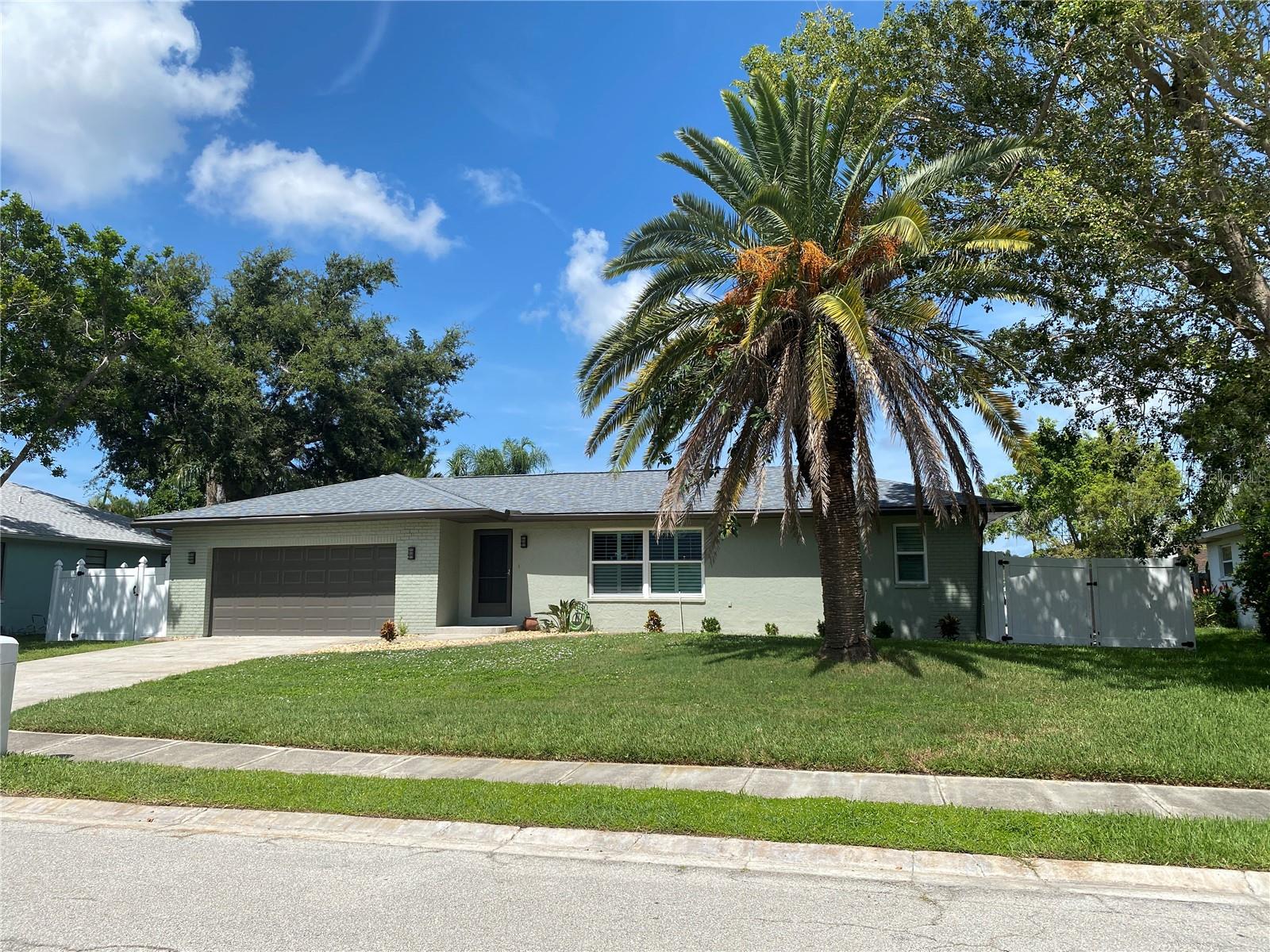 Exceptional opportunity for either a single family residence or vacation rental in NW Bradenton. Currently a vacation rental, this completely remodeled home offers a spacious open floor plan, swimming pool, HURRICANE WINDOWS and doors and a NEW ROOF in 2025. Solid surface quartz counter kitchen and baths, Luxury Vinyl Plank flooring, solid wood cabinets and artificial turf in the back yard makes this a must have. This 5 star rated AirBNB is popular due to its proximity to Anna Maria Island, Robinson Preserve, Local Restaurants and shopping. Explore miles of bird sanctuary just two miles down the road or relax on the sugar sand beaches of Anna Maria Island. If you are moving to area with school age dependents, the Martha King Middle School and Ida Stewart Elementary School are within several blocks from the home. This 3 bedroom 2 bath home has over 1800 sq feet of living space with a massive family room for plenty of entertaining and family time. The outdoor living area offers a quit place to enjoy outdoor dinning or a game of putt putt on the putting green. The home is being sold with the furnishings so all you'll have to do is pack a bag and move in. Put this on your must see list and start enjoying your tropical paradise today!