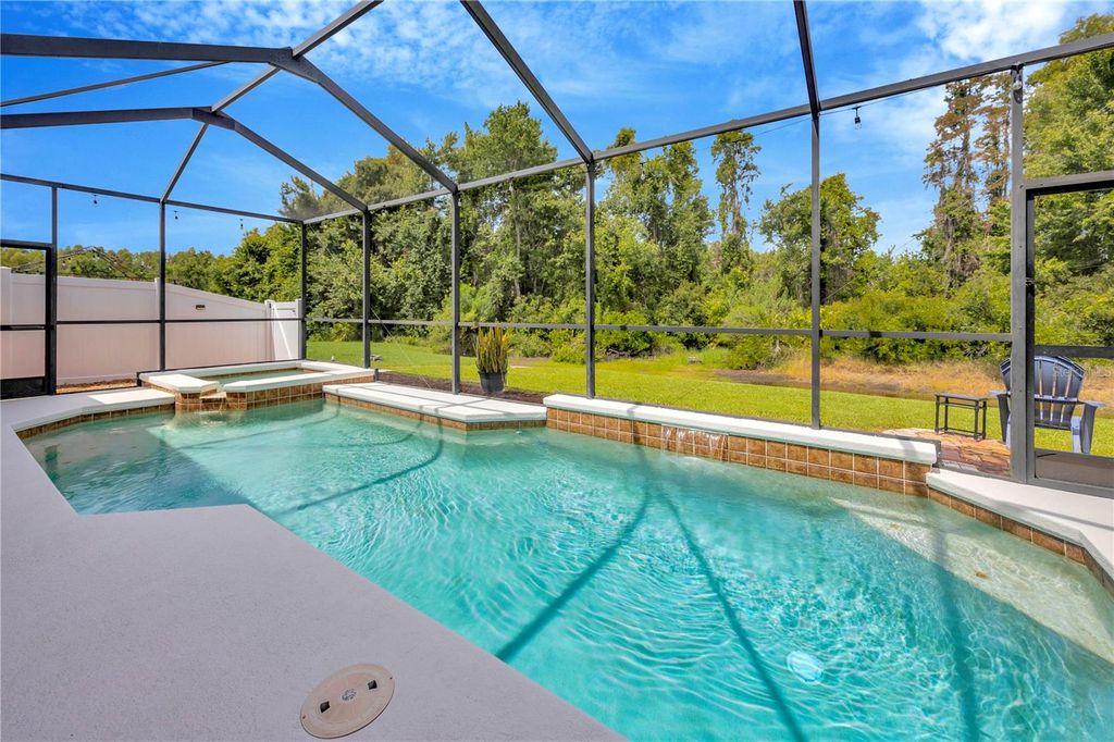 Photo of 31241 Kirkshire Court, Wesley Chapel, FL 33543 (MLS # TB8402025)