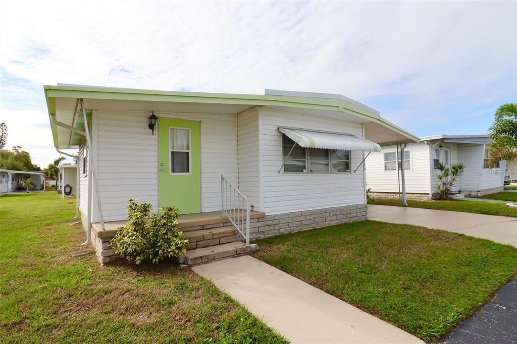 Photo of 11200 Walsingham Road #124, Largo, FL 33778 (MLS # TB8437783)