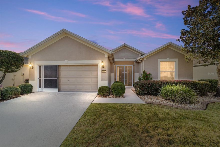 Welcome to Stone Creek, a premier resort-style 55+ active adult community in Ocala. This beautifully maintained Sheridan model overlooks a tranquil, park-like setting—your own peaceful backdrop for morning coffee or evening relaxation. Inside, you’ll find high ceilings, crown molding, and wood flooring throughout, creating a warm, elevated feel. The open floor plan seamlessly connects the living room and kitchen, perfect for everyday living and entertaining. The kitchen features hard-surface countertops, stainless steel appliances, a breakfast bar, closet pantry, and abundant cabinetry. Enjoy both casual dining space and a dedicated dining area. The primary suite offers a spacious walk-in closet, dual sinks, a private water closet, and a walk-in shower. Two additional bedrooms provide comfortable accommodations for guests or flexible space for hobbies and an office.  French doors lead to the enclosed lanai, where you can savor the peaceful backyard views, while the pergola adds shade and charm to the outdoor space. Additional features include an indoor utility room, two-car garage, 2023 roof, and 2021 HVAC & windows for peace of mind. Fantastic activities throughout Stone Creek for your enjoyment.

Furnishings and the electric Club Car golf cart may be purchased separately.