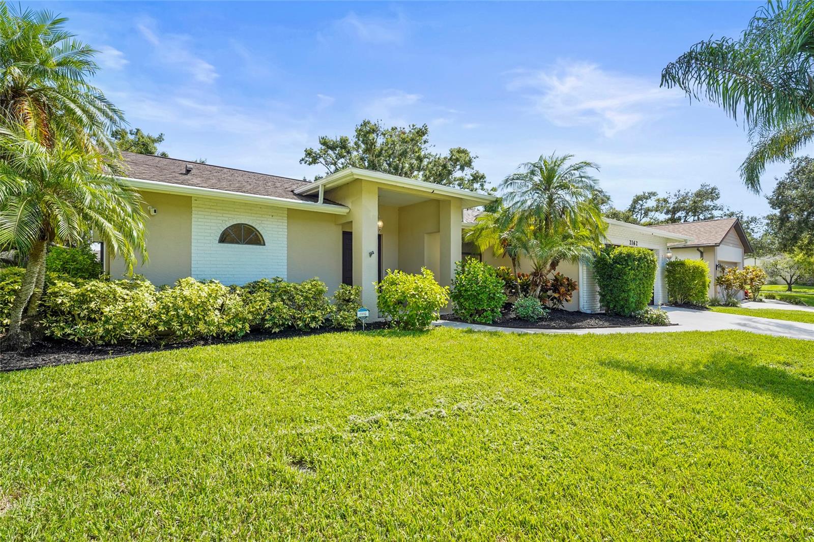 Welcome to this beautifully updated pool home, perfectly situated on a corner lot in the sought-after Colonial Oaks neighborhood. Step inside to an inviting layout with a split floor plan, offering both privacy and functionality. The newly renovated kitchen features new cabinets, sleek countertops, a live oak bar top, stylish backsplash, and new stainless-steel appliances, ideal for cooking and entertaining. A cozy fireplace with an accent wall adds warmth and character to the living space, while the birchwood accent branches in the entryway create a designer touch. Enjoy two seperate living areas on each side of the home. Updated with new lighting fixtures, ceiling fans, recess lighting, new luxury porcelain plank tile in each bedroom and living areas. The hall bath bas been updated with new custom tile, shower doors, toilet and vanity. The spacious master bedroom features a walk-in closet and ensuite bathroom. The bathroom features a walk-in shower with new tile , custom shower doors, vanity and toilet. The home opens to a private newly resurfaced pool and spacious patio, perfect for enjoying Florida living. The garage has new epoxy floors. Located close to top-rated schools, shopping, dining, and the area’s beautiful beaches, This move-in ready home combines comfort, style, and opportunity in one perfect package!