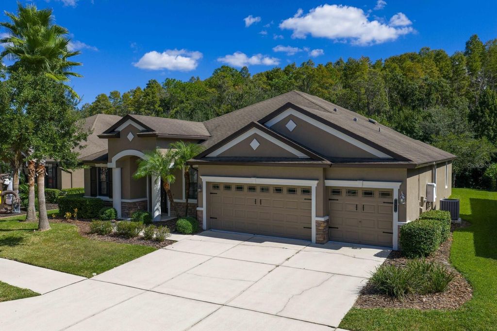 Photo of 7911 Hampton Lake Drive, Tampa, FL 33647 (MLS # TB8438116)