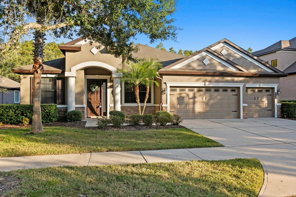 Photo of 7911 Hampton Lake Drive, Tampa, FL 33647 (MLS # TB8438116)