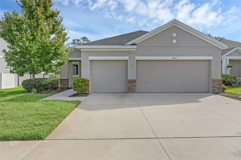 Photo of 17860 Passionflower Circle, Clermont, FL 34714 (MLS # O6322465)