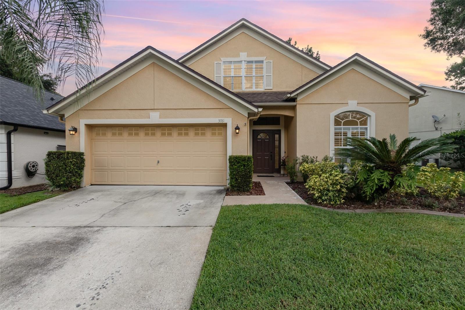 This amazing home minutes from UCF is truly a must see! Floor plan, upgrades, enhancements and location! Nestled in the highly coveted gated community of Carillon. This residence boasts an array of desirable features and renovated. Four bedrooms with oversized primary bedroom on first floor. Office with barn doors, private dining room and additional bedroom and full bathroom on main floor. Upstairs two spacious bedrooms, one with large, custom walk-in closet and a full bathroom. Two car garage with plenty of storage in garage and under stairwell additional closet. As you enter the stunning foyer you are mesmerized by the beauty and flow of home. Separate study with barn doors creating a stylish, private workspace. Stunning, oversized primary bedroom on main floor. Substantial, custom, walk-in closets. Primary bathroom features separate dual sinks, standalone walk-in shower and bathtub for luxurious relaxation. Large kitchen-family combo with amazing view in every room. Kitchen features Stainless-Steel appliances and plenty of cabinetry. Closet pantry. Gorgeous wood-like vinyl flooring throughout combining durability and elegance. New carpet on stairwell only. Freshly painted interior. Closets and storage in abundance. Custom baseboards throughout adding sophistication to every room. Spectacular light fixtures and ceiling fans with programmable remotes, enhancing comfort and style. High Vaulted Ceilings for a spacious feel and so bright and airy. This is the ideal entertainment home. Sliding doors bring you to the expansive backyard. Completely fenced for your fury family. What more could you ask for…Oversized 2 car garage with an abundant of storage options both inside and out. Carillon is so centrally located to Oviedo on the Park, Waterford Lakes, UCF, SSC, and 408 which takes you straight to Downtown Orlando. And there is always a day Disney or at the wonderful Beaches.. Excellent A-Rated Seminole County Schools. Location, Location, Location. Call today for your private viewing before it’s too late. Welcome Home!