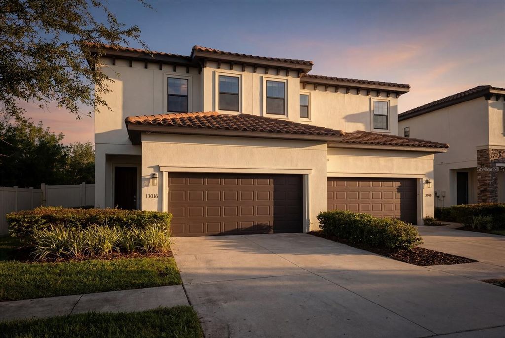 Photo of 13016 Sanctuary Village Lane, Tampa, FL 33624 (MLS # TB8480100)