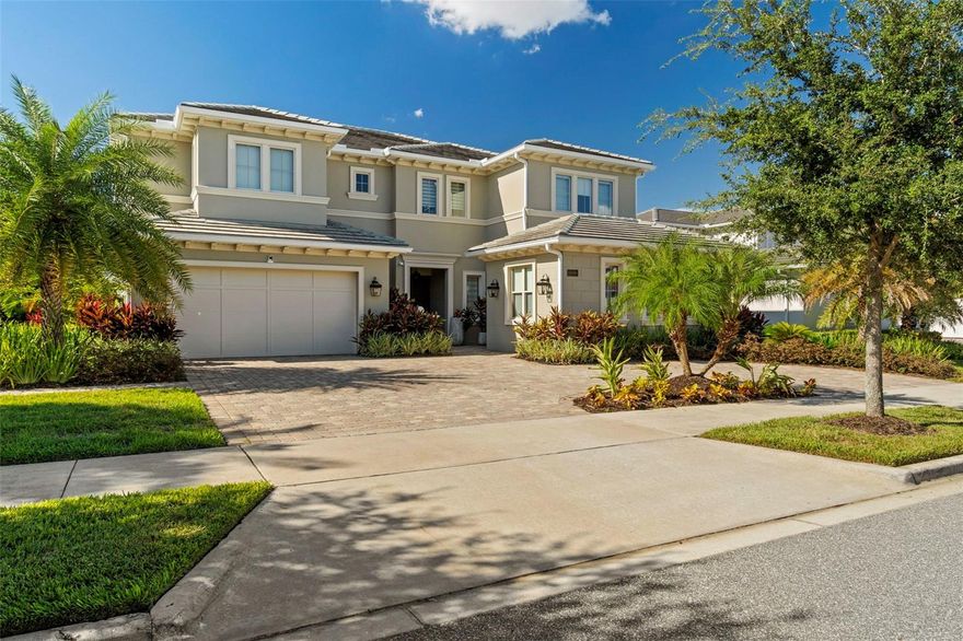 Welcome to 15699 Panther Lake Dr, a breathtaking lakefront residence. This fully furnished home has been meticulously upgraded with nearly $1 million in custom improvements, creating a one-of-a-kind luxury retreat.

As you step inside, you’re greeted by a sophisticated open-concept design filled with natural light and panoramic lake views. The chef’s kitchen boasts a grand center island, premium cabinetry, and top-of-the-line stainless steel appliances—perfect for both everyday living and entertaining.

The primary suite is an oasis of elegance featuring a spa-inspired bathroom and a custom-designed, oversized walk-in closet that is truly a dream come true. This boutique-style dressing room showcases floor-to-ceiling glass-front cabinetry, custom drawers with brass hardware, built-in shelving, and thoughtfully designed lighting. With its plush seating area and display shelving for luxury items, it offers the perfect blend of function and sophistication.

Spacious guest bedrooms and thoughtfully appointed living areas provide comfort and style for family and friends. For those who work remotely, the home also includes a dedicated office with its own private entry—an ideal space for productivity, privacy, or meeting clients without disturbing the rest of the household.

Step outdoors to a resort-style backyard that feels like your private escape. The infinity-edge pool overlooks serene water views, while the summer kitchen, fire pit, and expansive lounging areas create the ultimate space for relaxation and gatherings. Whether hosting a sunset dinner or unwinding by the fire, every detail of this outdoor paradise has been designed for luxury living.

Residents of Lakeshore Preserve enjoy exclusive amenities, including a clubhouse, fitness center, resort-style pool, playgrounds, and kayak access. The community is ideally located near top-rated schools, world-famous theme parks, major highways, and premier shopping and dining destinations.

This rare opportunity to own a fully customized, move-in ready lakefront masterpiece won’t last long—schedule your private tour today!