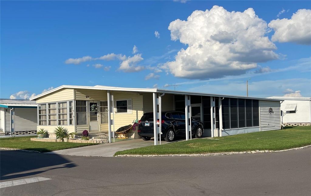 Photo of 2012 Maui Drive, Holiday, FL 34691 (MLS # TB8429270)