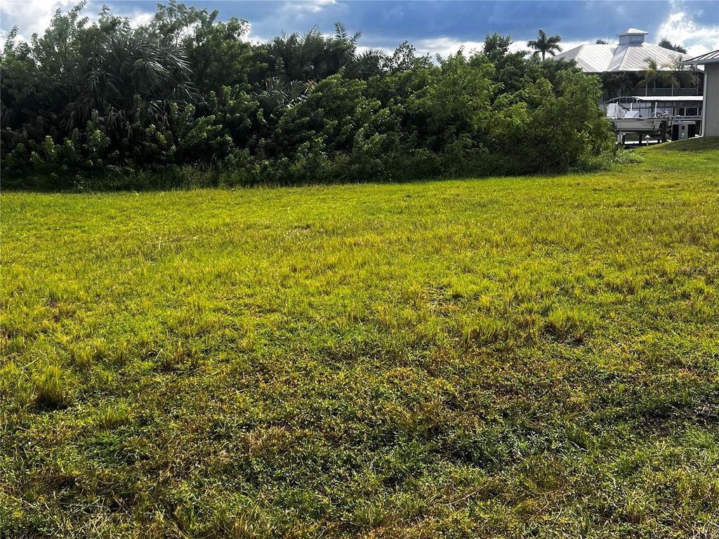 Photo of 24333 Pirate Harbor Boulevard, Punta Gorda, FL 33955 (MLS # A4668102)