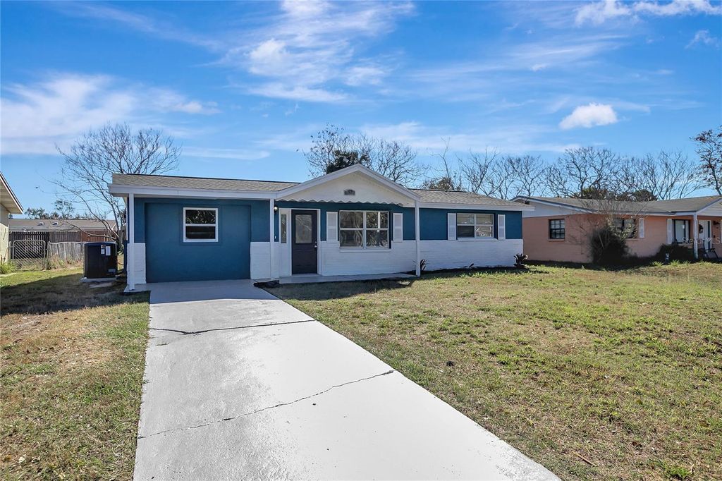 Photo of 7534 Galahad Road, Port Richey, FL 34668 (MLS # TB8480211)