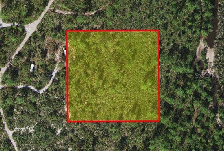 This property is for recreational use only. Owning a lot in Suburban Estates entitles you to a key for the main gate and
entry to Suburban Estates. Suburban Estates covers over 11,000+ acres of land which is known for camping, fourwheeling,
fishing, hunting, etc. This is not a buildable lot. Owner does not have key to gate. Due to the nature of this type of property, showings are not given by listing agent. You may use the coordinates provided to view the aerials that are available on Google earth or visit the Osceola County
Property Appraisers website to get an overview of the area.