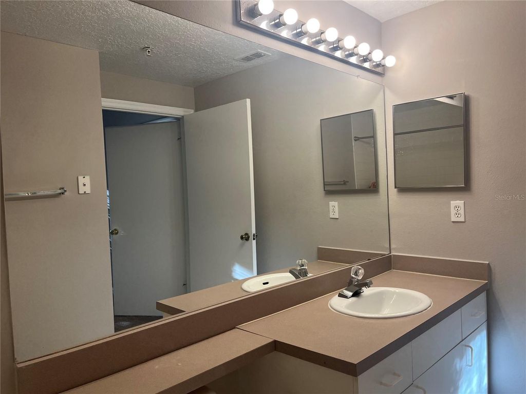 Photo of 5572 Metrowest Boulevard #20, Orlando, FL 32811 (MLS # O6364993)