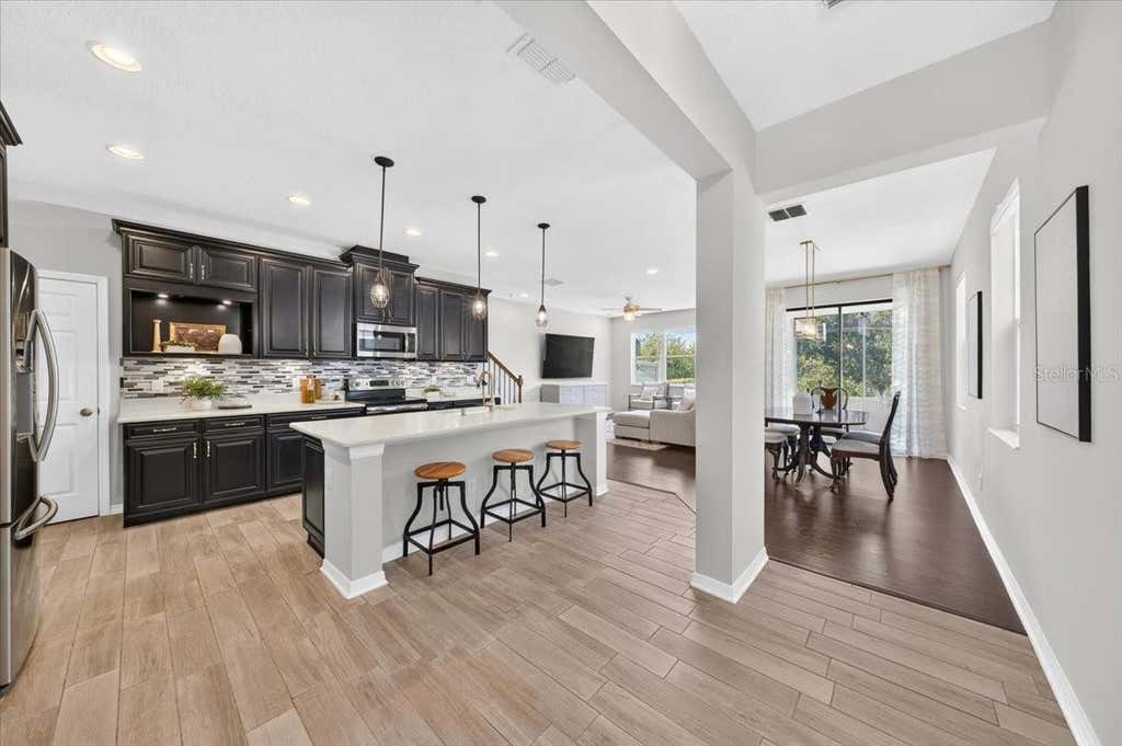 Photo of 11528 Crowned Sparrow Lane, Tampa, FL 33626 (MLS # TB8540234)