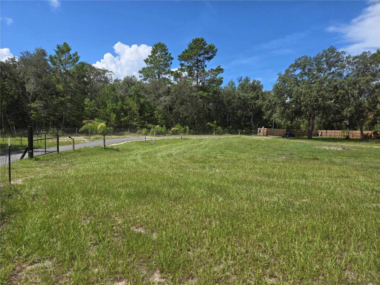 *Live, Work & Play—All on 3.7 Beautiful Acres!*
Discover the perfect blend of privacy, opportunity, and location with this exceptional property in Spring Hill. The charming 3-bedroom, 2-bath home features a split floor plan, an upgraded kitchen, and a custom primary suite with its own en-suite bath and walk-in closet. What truly sets this property apart is its PO1 zoning (Professional Office)—offering incredible flexibility. A solid concrete building with office space and a half bath is already in place, ideal for running your own business or generating rental income.
Need space? You’ve got it! Bring your boats, RVs, toys, animals—even horses—there’s room for everything here. The property is fenced and includes additional storage sheds. Whether you want to create a private homestead, a hobby farm, or just enjoy wide-open space, this property has endless potential.
And there’s more—included is a separately deeded, fully fenced 1-acre lot, surrounded by mature trees, providing a peaceful natural setting with added privacy. There is a separate entrance to the 1-acre property on Dansville Dr.
Conveniently located near the Suncoast Parkway, schools, shopping, restaurants, and medical facilities—this is a rare opportunity to invest in a versatile property that offers both lifestyle and business possibilities. Spend your weekends exploring the natural beauty of Weeki Wachee Springs State Park, only 9 miles away—where you can kayak through winding waterways, float along lazy river tubes, or take a refreshing dip in the crystal-clear springs. Just 15 miles away, Veterans Memorial Park invites you to stay active with its scenic walking trails, sports fields, and peaceful picnic spots. When you're ready for coastal charm, Hudson Beach is a quick 12-mile drive and offers sandy shores, a full-service marina, and waterfront dining—ideal for soaking up sunsets and enjoying a laid-back day by the Gulf.