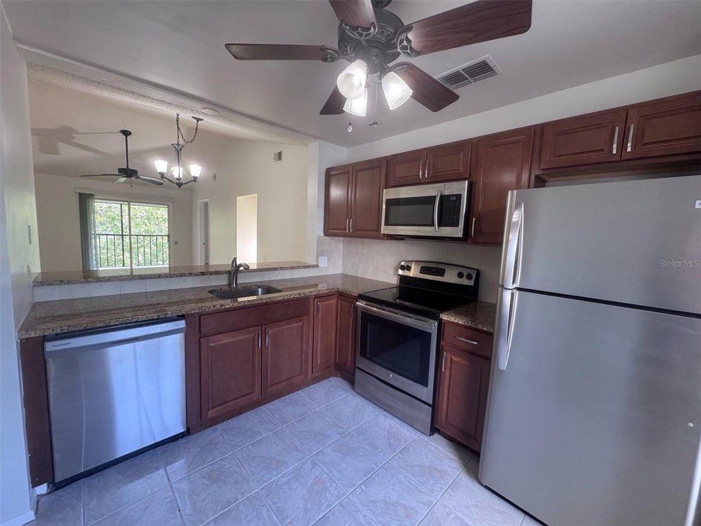 Photo of 5265 E Bay Drive #122, Clearwater, FL 33764 (MLS # A4697802)