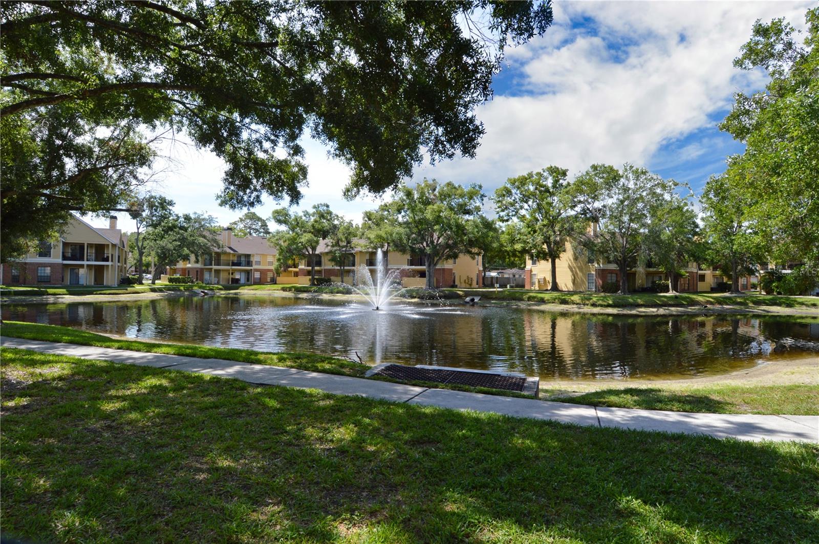 Welcome to Paradise at The Grand Reserve Condominiums in Tampa. This condo is a one bedroom and one bathroom with white beveled kitchen cabinets, large closet pantry, Corian countertops, black appliances, full size stackable washer & dryer, high ceiling, tile floors throughout. Located on the 1st floor with a covered fenced-in patio w/storage rm overlooking gorgeous landscaping and lake. Rent Includes: Trash and 1 assigned parking spot. No pets allowed. The Grand Reserve Condominiums in Tampa is a gated community with great amenities from a Clubhouse, laundry facility, resort style swimming Pool & Spa, cabanas, Fitness Center, lighted Tennis courts, gazebo, and walking trails. You are just South of Carrollwood and steps away from the heart of Tampa's shopping, dining, arts & culture, Raymond J. Stadium, Veterans and 275, Downtown Tampa, Tampa International Airport and a short drive to the beautiful Gulf coast beaches and St. Petersburg.