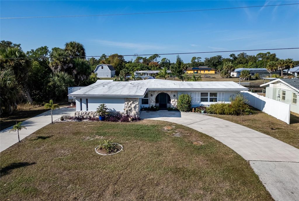 Photo of 3349 Rock Creek Drive, Port Charlotte, FL 33948 (MLS # OM714331)