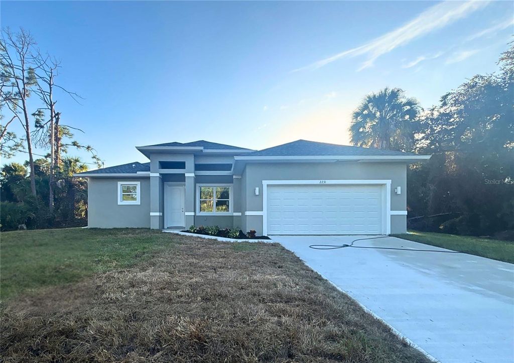 Photo of 2231 Vancouver Lane, North Port, FL 34286 (MLS # O6365044)
