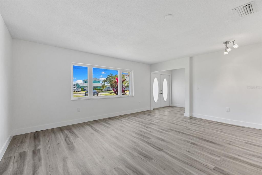 Photo of 6026 Bayou Grande Boulevard NE, St Petersburg, FL 33703 (MLS # TB8447508)