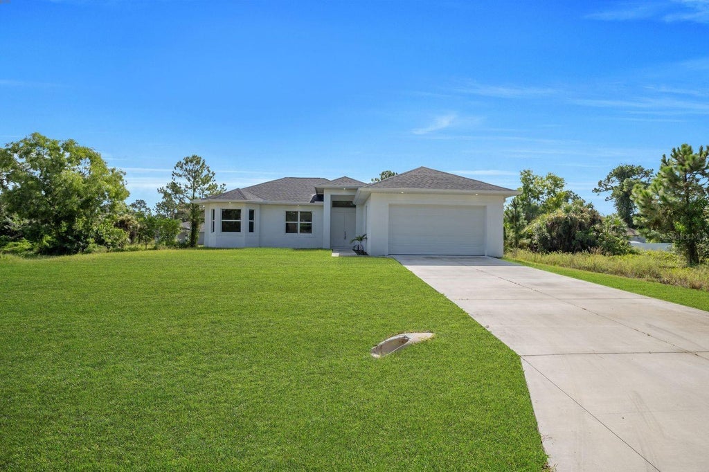 Photo of 523 Harry Thayer Avenue S, Lehigh Acres, FL 33974 (MLS # A4704639)