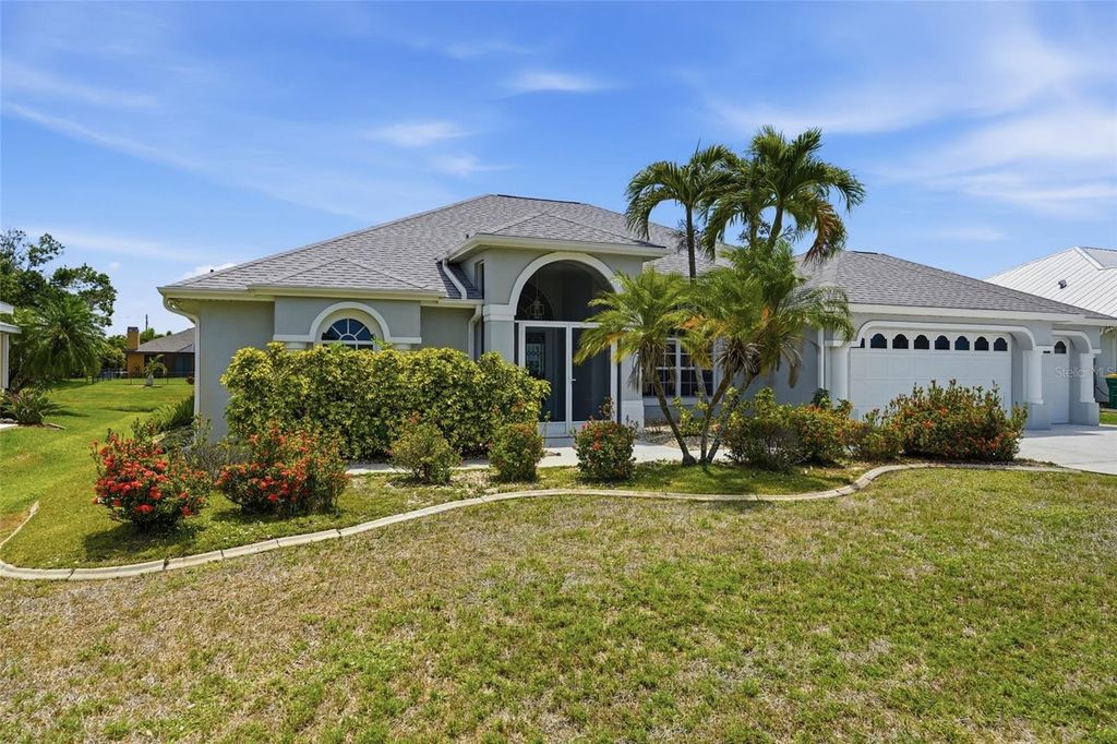 Photo of 885 Rotonda Circle, Rotonda West, FL 33947 (MLS # O6400168)