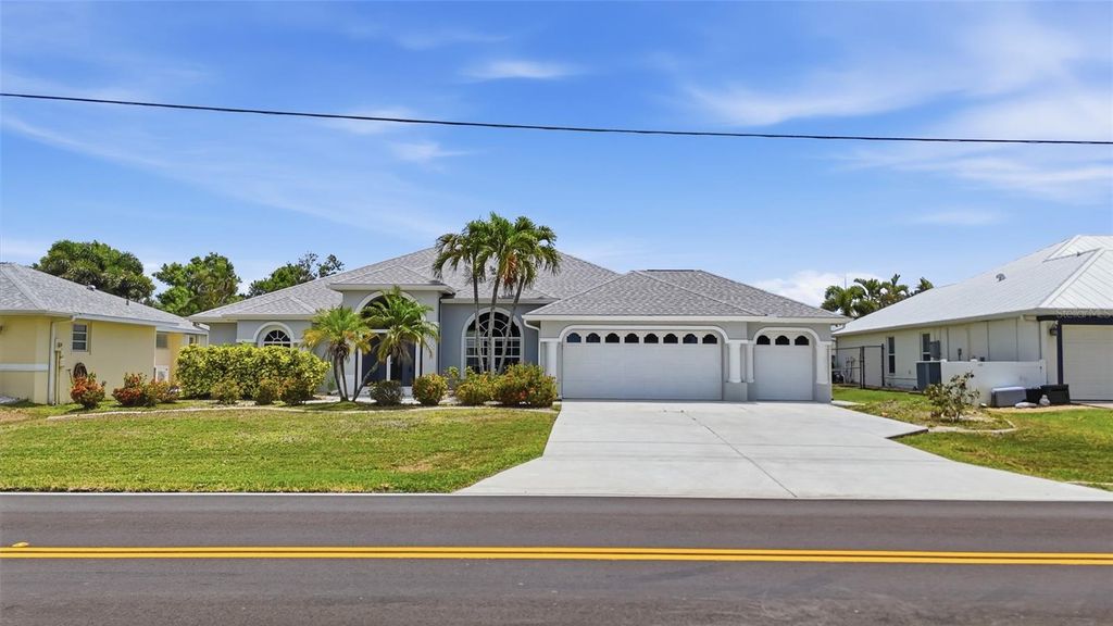 Photo of 885 Rotonda Circle, Rotonda West, FL 33947 (MLS # O6400168)
