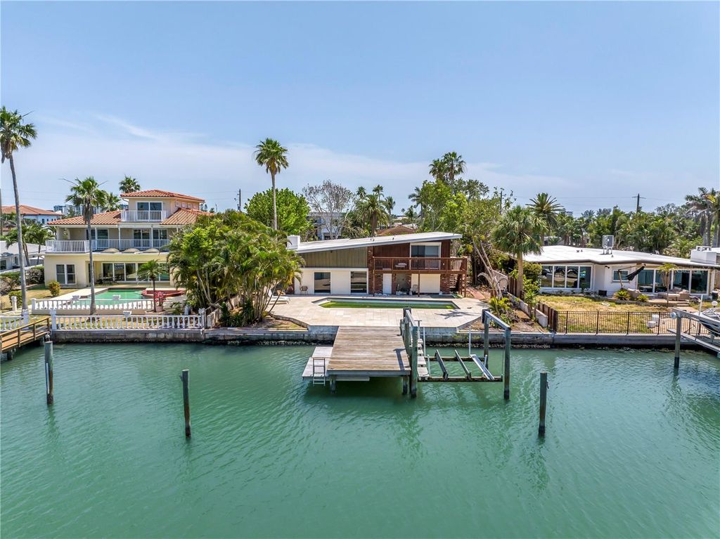 Photo of 31 Dolphin Drive, Treasure Island, FL 33706 (MLS # TB8385856)