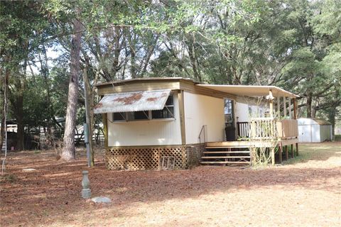 Photo of 19591 SE 77th Place, Morriston, FL 32668 (MLS # OM711186)