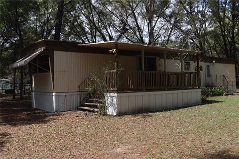 Photo of 19591 SE 77th Place, Morriston, FL 32668 (MLS # OM711186)
