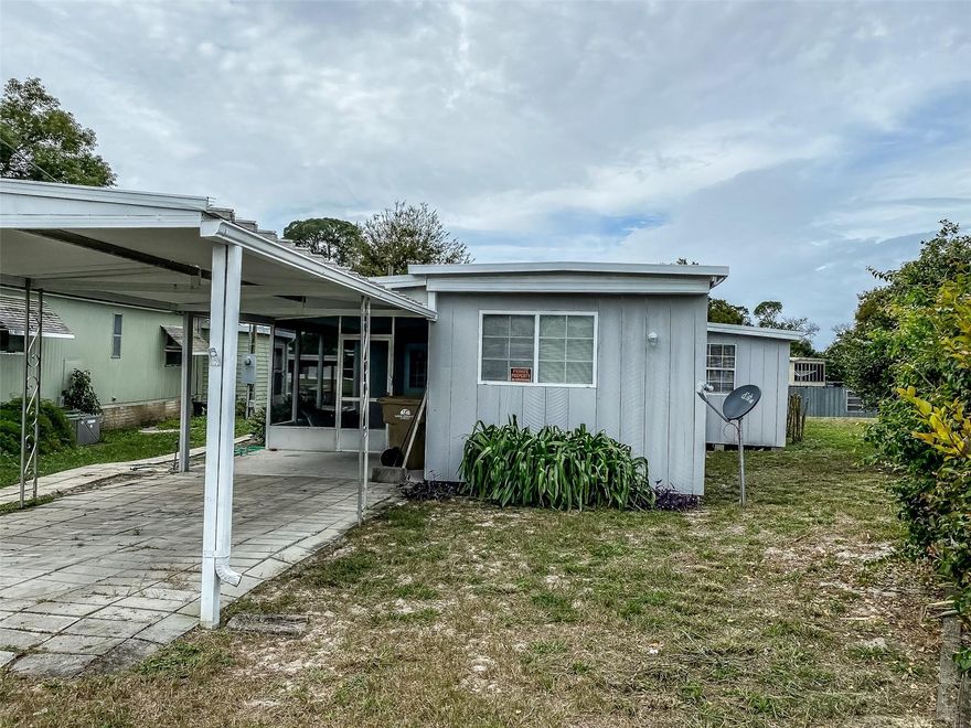 WOW! GREAT PASSIVE INCOME!!! Amazing opportunity to own a canal front 2/2 property at an incredible price! Canal goes out to Harris Chain of Lakes. Two boat houses. Less than an hour to Orlando, 40 minutes to Disney, 20 minute to historic Mount Dora and it’s great shops and restaurants, 10 minutes to Publix. Owner is out of state and no longer wants to manage it from a distance. Property was rented until end of October for $1350/month. 2 boat houses, large lot. Lot allows for replacement of mobile home by a brick house. Don't miss this opportunity to own something on a canal to the lakes in growing Lake County!