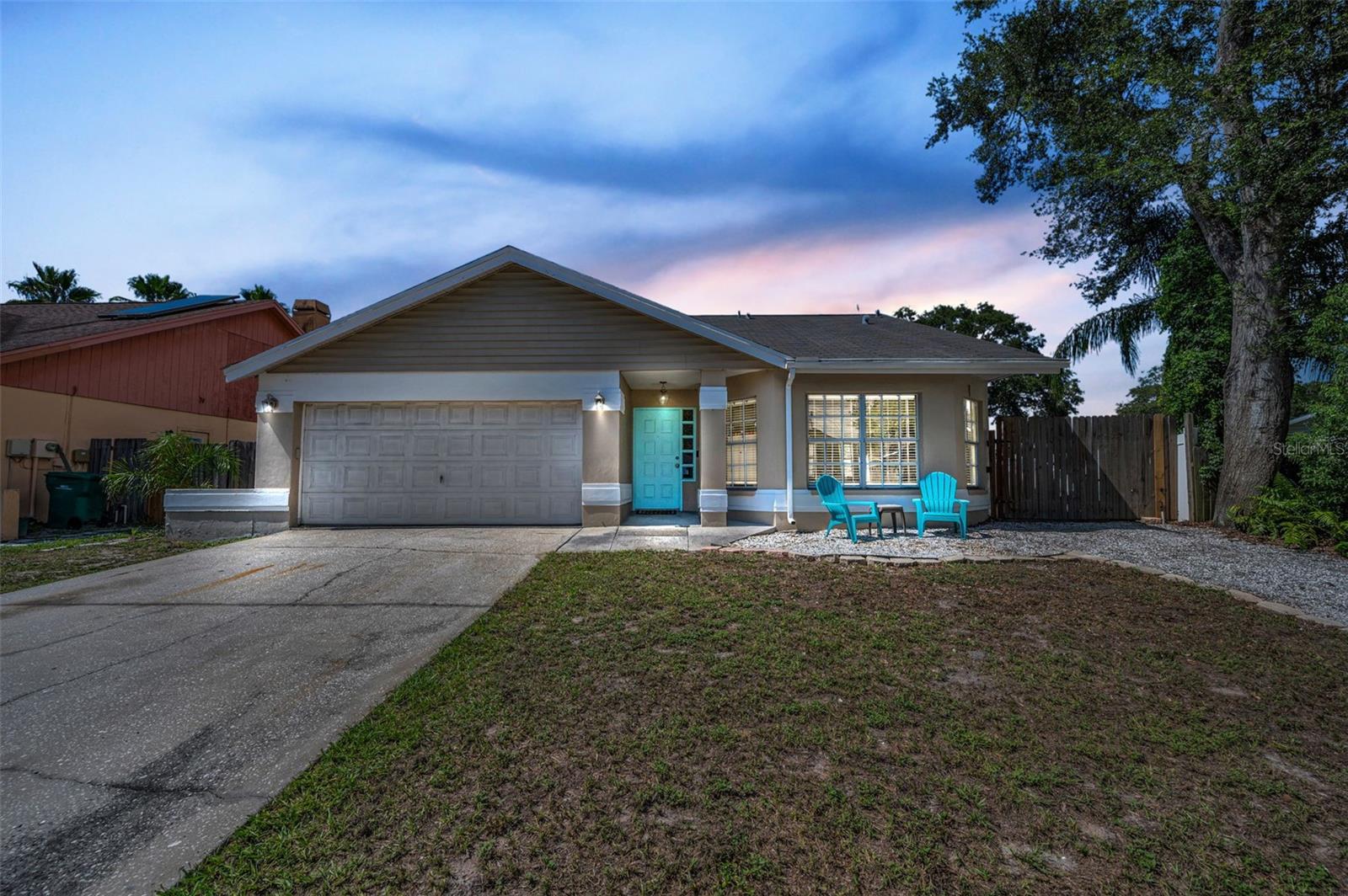 Welcome to your dream home in the heart of Palm Harbor's sought-after Countryside North neighborhood! This spacious and light-filled 3-bedroom, 2-bath residence combines modern upgrades with timeless charm in a location that’s hard to beat. Step inside and be greeted by soaring ceilings and an open-concept layout that creates a sense of airiness and flow. The updated kitchen is the heart of the home—featuring sleek granite countertops, beautiful wood cabinets, stainless steel appliances, and a large bar perfect for entertaining or casual dining. Both bathrooms are tastefully appointed, and all three bedrooms offer generous space and natural light. The primary suite includes a walk-in closet and a private en-suite bath for your comfort and convenience. Outside, enjoy Florida living with a fenced backyard ideal for pets, play, or outdoor gatherings. Mature landscaping adds privacy and curb appeal, while the two-car garage offers ample storage. Located minutes from top-rated schools, parks, shopping, dining, and the Gulf beaches, this home delivers the perfect blend of location, lifestyle, and value. A Brand New shingle Roof will be installed prior to closing! Don’t miss the opportunity to make this beautifully updated home your own—schedule your private tour today!