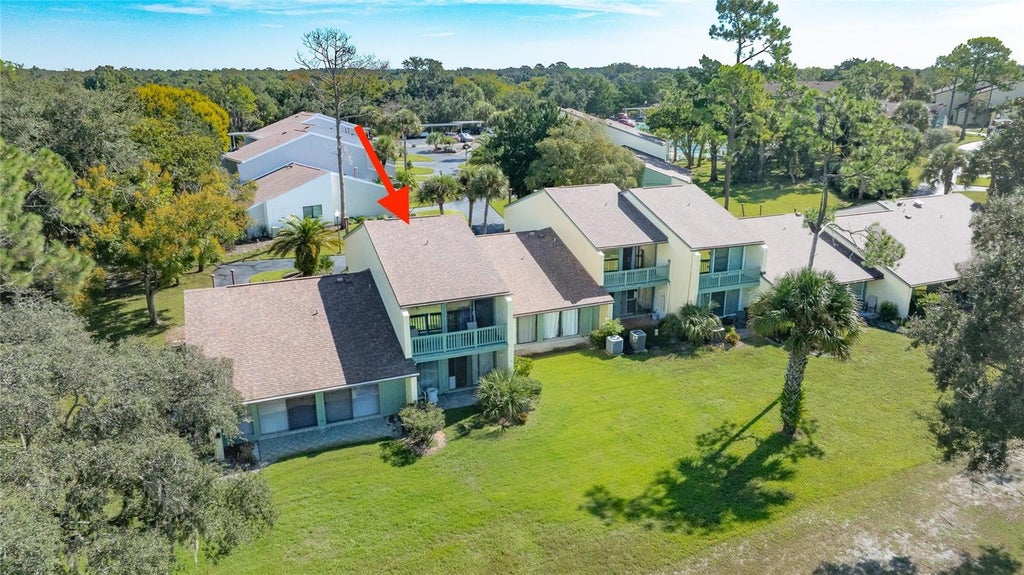 Photo of 219 Club House Boulevard #219, New Smyrna Beach, FL 32168 (MLS # NS1089384)