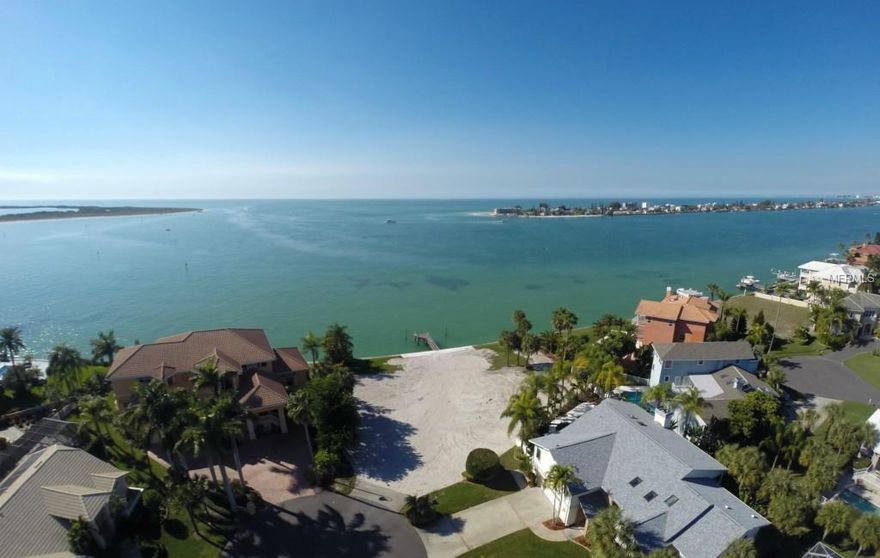 #1 premier location with 150 feet (MOL)of open water views to the Gulf of Mexico in Tierra Verde! It's time to dream big...this estate size residential lot is ideally situated on the end of a cul de sac among multi-million dollar homes and ready for the home of your dreams! This recently excavated lot is almost 1/2 acre and is already equipped with a large dock. There is no need to travel when you can enjoy Florida’s dazzling sunsets and the breathtaking unobstructed views of the Gulf of Mexico, Shell Island, and Pass-A-Grille every day. Tierra Verde is an island community with two marinas, several restaurants and shops! This convenient location is just minutes to the interstate, only 30 minutes to Tampa International, and sits right next door to the nationally renown park of Fort Desoto Park and the beautiful white sand beaches of St Pete Beach! (Survey shows home prior to home excavation.)