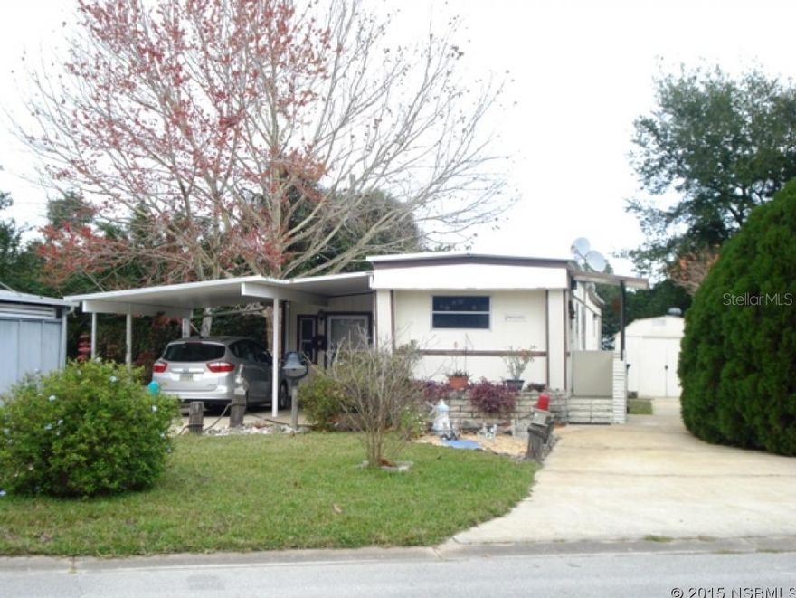 THE PERFECT VACATION SPOT OR SNOWBIRD HIDEOUT. OWNERS HAVE UTILIZED EVERY INCH OF SPACE TO MAKE THIS HOME PERFECT FOR STORAGE AND LIVING. LOCATED IN A WATERFRONT COMMUNITY YOU HAVE ACCESS TO TWO SWIMMING POOLS, FISHING PIER AND BOAT RAMP AS WELL AS A BEAUTIFUL CLUB HOUSE. THE FAMILY ROOM HAS SEPARATE ENTRANCE AND COULD BE USED AS AN IN-LAW SUITE OR THIRD BEDROOM. WOOD BURNING STOVE MAKES IT WARM AND COZY. GLASS TOP RANGE, REFRIGERATOR AND WASHER AND DRYER INCLUDED. THE HOME HAS NEW ALURE WOOD GRAIN FLOORING. NEW AIR CONDITIONING SYSTEM IN 2009 THAT IS INSPECTED AND CLEANED ANNUALLY. RECENT ROOF INSPECTION INDICATED AT LEAST 14 YEARS OF LIFE LEFT. THE LARGE SHED IN THE BACKYARD HAS 220 ELECTRIC AND IS PERFECT FOR A WORKSHOP OR A HOBBYIST. THERE ARE TWO DRIVEWAYS AND A COVERED CARPORT. THE BEAUTIFUL LOT HAS MATURE SHADE TREES AND LANDSCAPING. THIS WELL MAINTAINED HOME HAS HAD THE SAME OWNERS FOR 30 YEARS.   ALL BUYERS MUST BE PARK APPROVED. ;Water: City