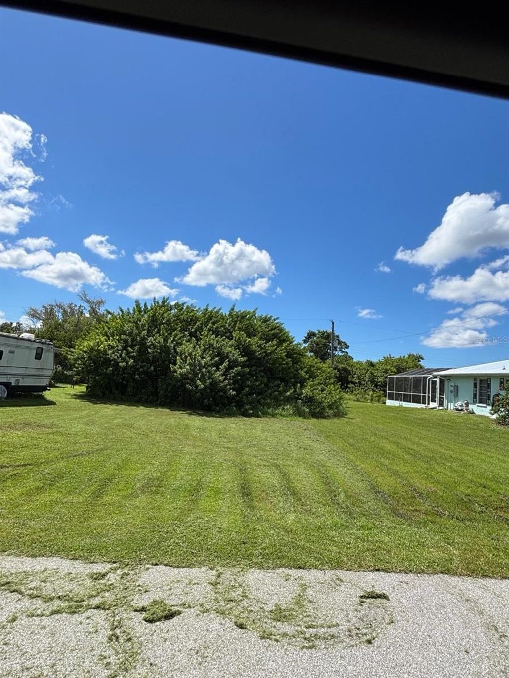 Photo of 193 Garden Avenue NW, Port Charlotte, FL 33952 (MLS # TB8495804)