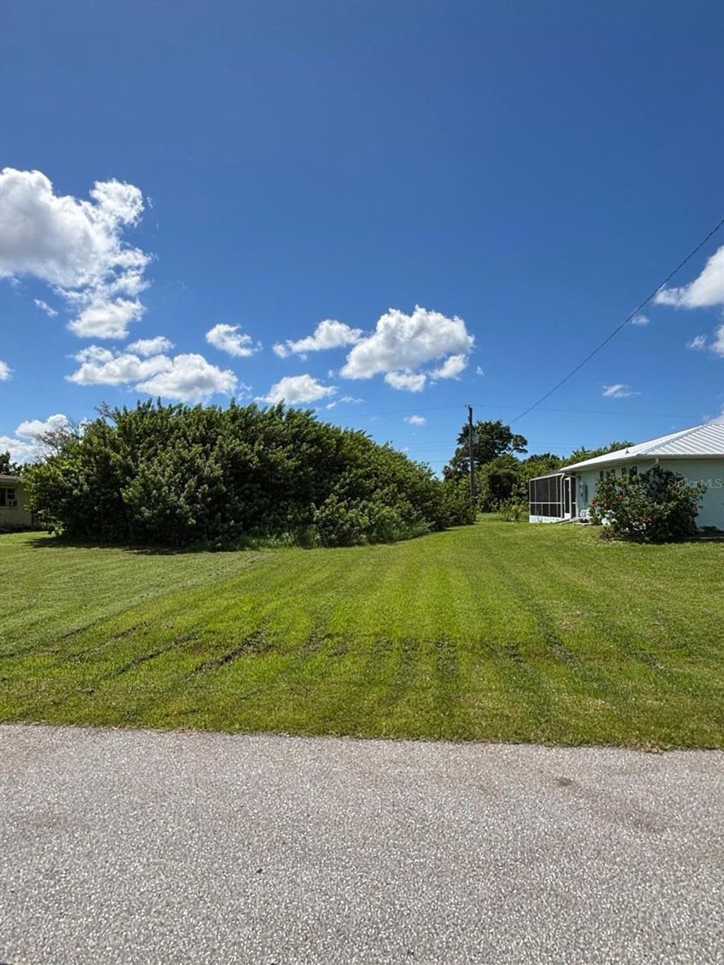 Photo of 193 Garden Avenue NW, Port Charlotte, FL 33952 (MLS # TB8495804)