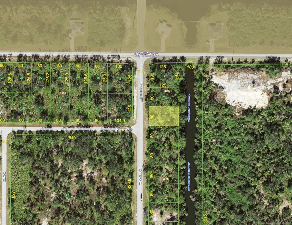 Photo of 26 Yorkshire Street, Port Charlotte, FL 33954 (MLS # TB8558960)