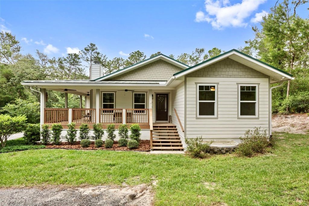 Photo of 925 Blackjack Ridge Trail, Lake Helen, FL 32744 (MLS # O6399413)