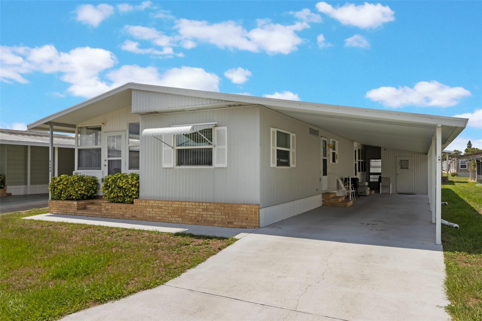 Welcome to your move in ready home in Oakwood Estates, a gated community designed for those aged 55 and older. This beautifully maintained 2-bedroom, 2-bathroom manufactured home comes fully furnished and is being sold as-is, allowing you to move in comfortably without additional expenses. The double panes windows add thermal efficiency, and the 2014 shingle roof is in great condition .
Features Include:
- Two spacious bedrooms (split bedroom ) and bathrooms
- Two attached screened-in porches, perfect for enjoying the Florida sunshine
- Utility shed for additional storage (houses washer/dryer)
- Parking space for two vehicles
- Access to community amenities, including swimming, shuffleboard, fishing pier, and tennis
Location:
Conveniently located close to shopping centers and restaurants, everything you need is just a short drive away. Enjoy a vibrant community lifestyle with various social activities and events right at your doorstep.
This section is a “No Dog” area but other inside pets are acceptable (cat, bird, fish)