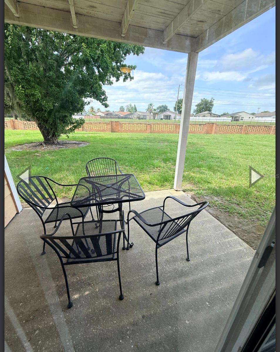 Photo of 2490 Sweetwater Club Circle #65, Kissimmee, FL 34746 (MLS # S5159065)