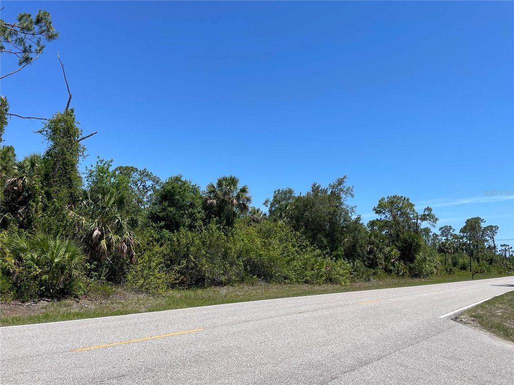 Photo of 160 Prineville Street, Port Charlotte, FL 33954 (MLS # C7508389)