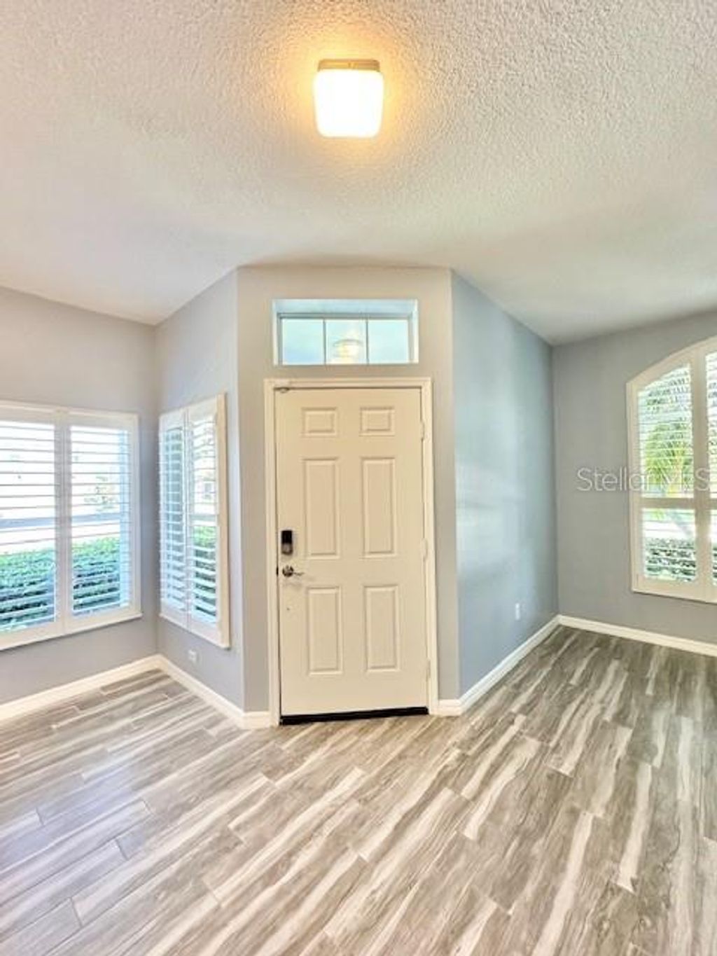 Photo of 9999 Indigo Bay Circle, Orlando, FL 32832 (MLS # O6396493)