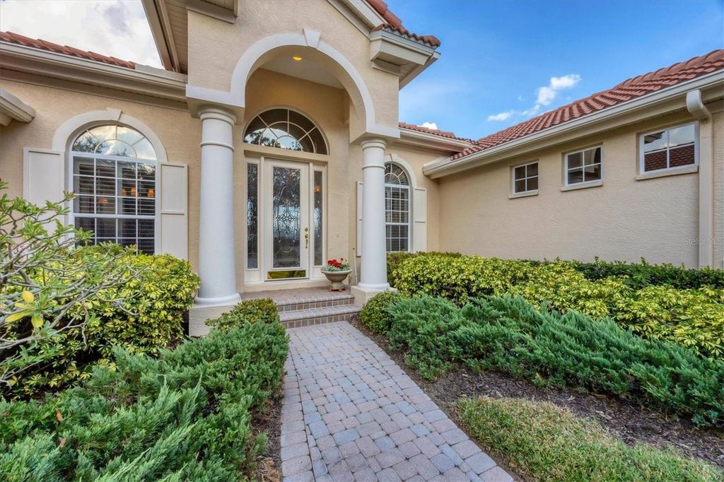 Photo of 7915 Warwick Gardens Lane, University Park, FL 34201 (MLS # A4673327)