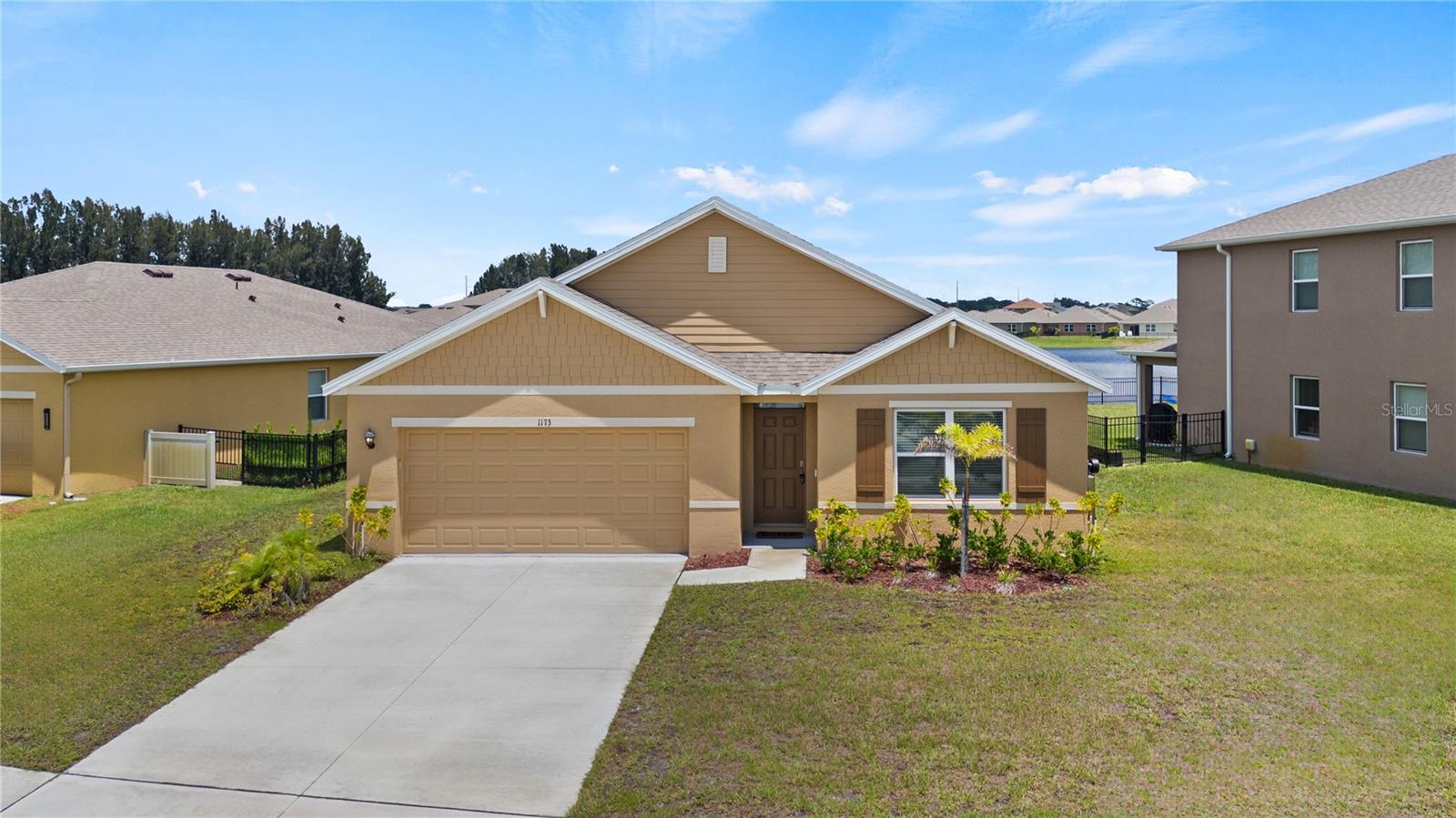Welcome to your dream home!
This stunning nearly-new ranch-style home offers the perfect blend of modern comfort and style. Featuring a spacious open floor plan with 4 bedrooms, 2 full baths, and a 2-car garage, this home is ideal for both everyday living and entertaining.
The chef-inspired kitchen boasts stainless steel appliances, a walk-in pantry, and a large island—perfect for gatherings. Enjoy abundant natural light throughout the main living, dining, and kitchen areas, all beautifully finished with durable ceramic tile flooring.
Designed as a Smart Home, it comes equipped with a built-in security system and smart doorbell for added peace of mind. Step outside to a generously sized backyard with 44 feet of water access—the perfect spot to watch rocket launches from the comfort of your covered patio.
Located just 15 minutes from The Avenue Viera, you’ll have access to top-tier shopping, dining, and entertainment. The community also features a pool, playground, and walking trails for an active lifestyle.
This immaculate, move-in-ready home is a must-see!