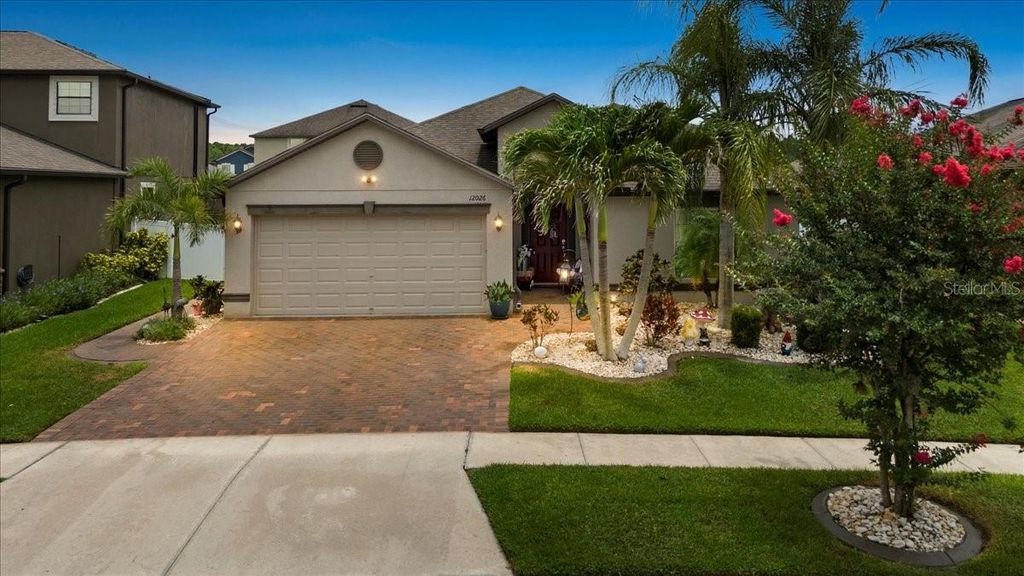 Photo of 12026 Crestridge Loop, New Port Richey, FL 34655 (MLS # TB8393929)