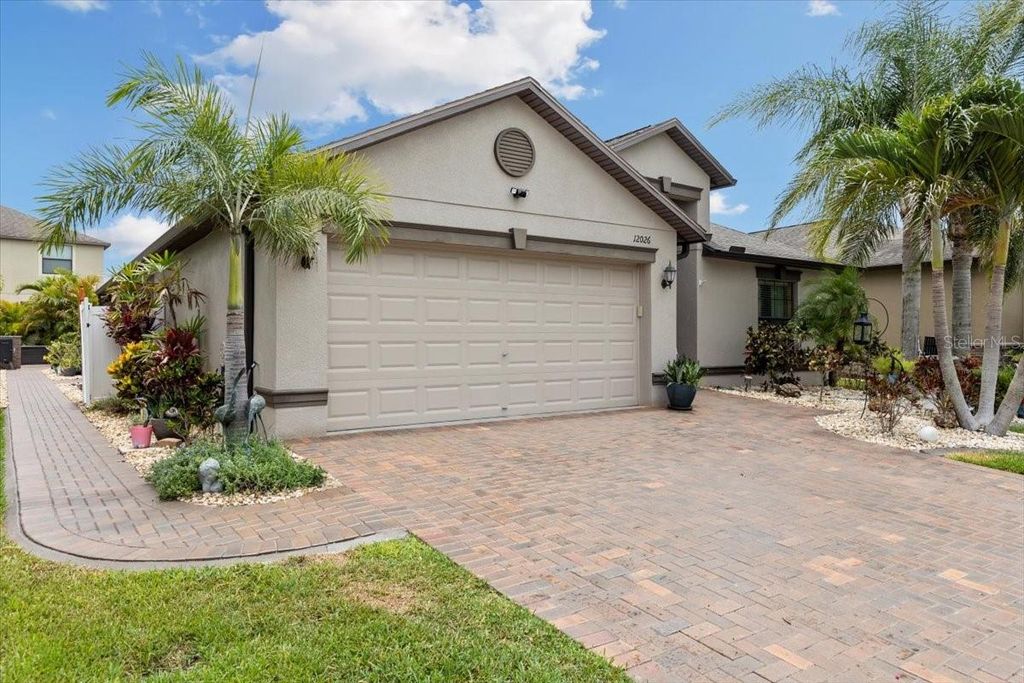 Photo of 12026 Crestridge Loop, New Port Richey, FL 34655 (MLS # TB8393929)